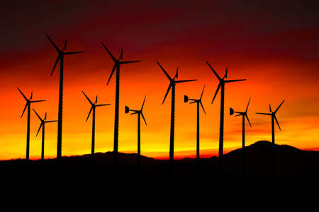 Wind turbine power generator at twilight の写真素材