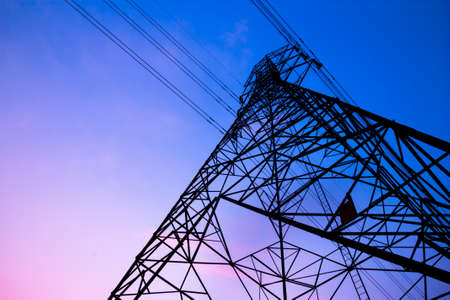 High voltage post and sky in twilight timeの写真素材