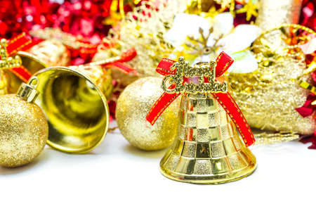 Christmas background with golden bell ornamentの写真素材