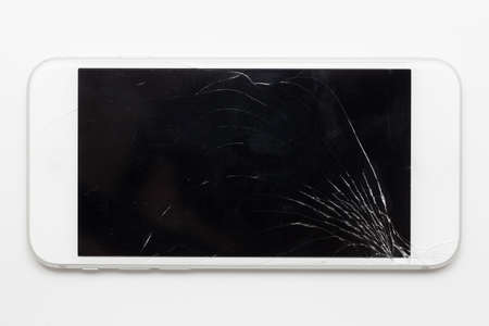 Smartphone with broken screenの写真素材