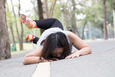 Accident. stumble and fall while joggingの写真素材