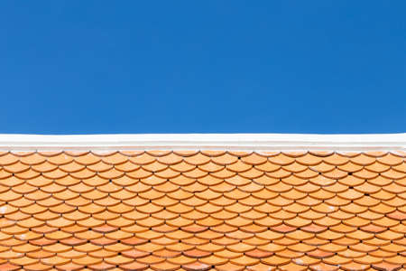 Roof tile with blue skyの写真素材