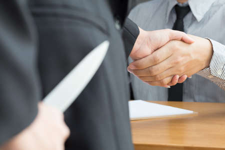 Blackmail concept, Business handshake and doing agreement