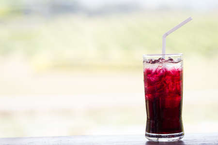Grape juice on the table with blur background.の写真素材