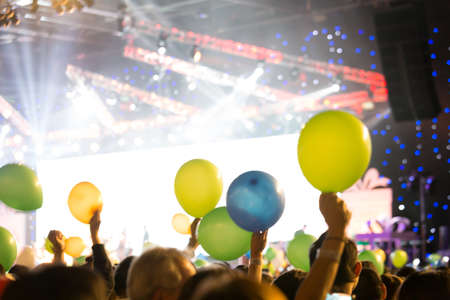 Cheering crowd in new year party,  holiday celebration backgroundの写真素材