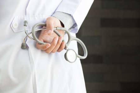 Doctor with a stethoscope in the handsの写真素材