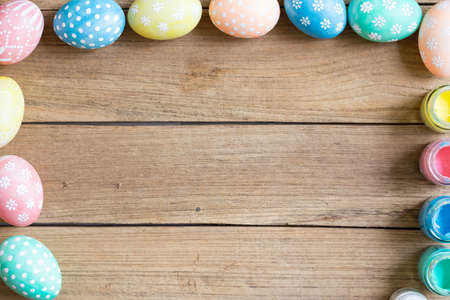 Easter eggs with wood backgroundの写真素材