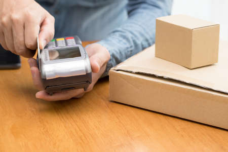 POS terminal confirms the payment by debit credit card
