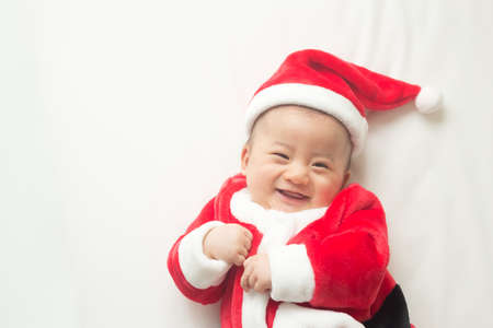 Christmas Santa Claus asian baby boy and happy new year festivalの写真素材