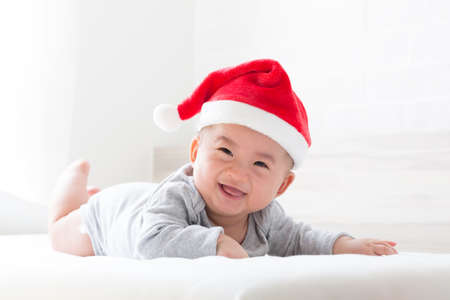 baby smile and santa hat