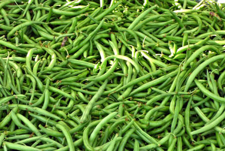 Green beans for sale at the Cherry Street Farmers Market in Tulsa Oklahoma. Morning in summer.