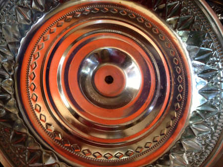 Aluminum and silver with orange reflection