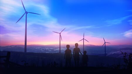 Children at dusk watching wind turbines against the blue skyの写真素材