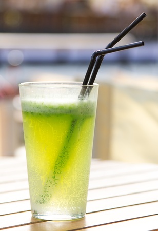 Glass of lemonade with green fresh mint outdoor in the sunの写真素材