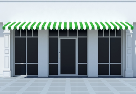 Shopfront in the sun - classic store front with green awningsの写真素材