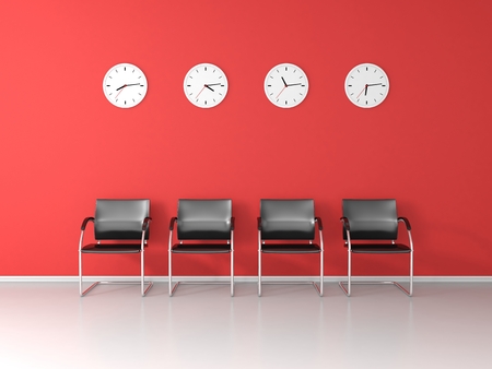 Four chairs and four different clocks in the red waiting roomの写真素材
