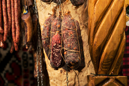 Romanian traditional meat products, by smoked pork hanging in smokehouse