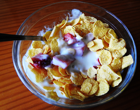 Cup of cereals, yogurt and strawberries
