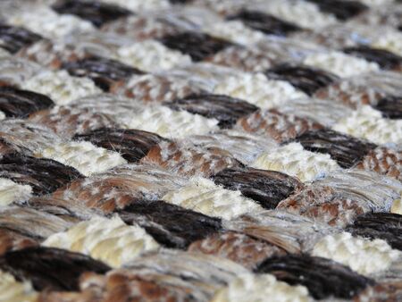 Textured braided background in diagonal brown colors