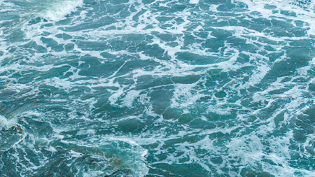 Beautiful blue wave water for abstract background from natural sea ocean in summer, motion texture...