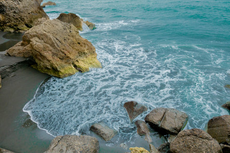 Beautiful blue water sea wave ocean and white sand coast beach with rock, nature seascape landscape and coastline stone shore in summer holiday vacation, travel island background bay cliff tropicalの写真素材