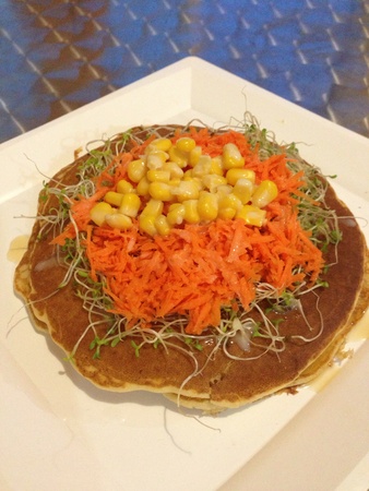 A hotcake of corn, carrot and alfalfa.