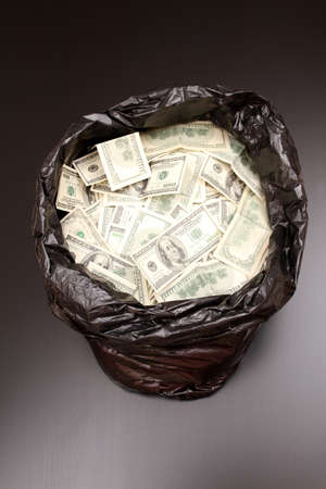 A Rubbish bag full of dollars 
の写真素材