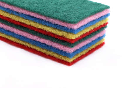 A pile of sponges in different colorsの写真素材