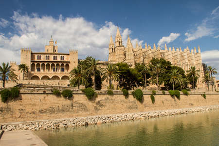 Royal Palace of La Almudaina and Cathedral La Seu in Palma de Mallorca, facing Parc de la Marのeditorial素材