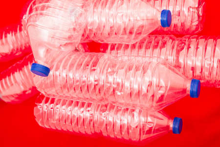 Empty bottles of mineral water, with a red 
の写真素材