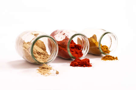 Variety of spices in a glass pot.の写真素材