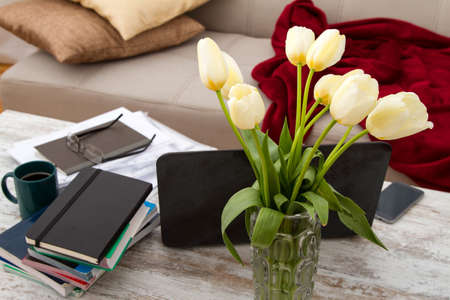 Working at home with a laptop till lateの写真素材