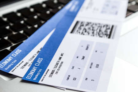 Airline tickets over the keyboard of a laptop
の写真素材