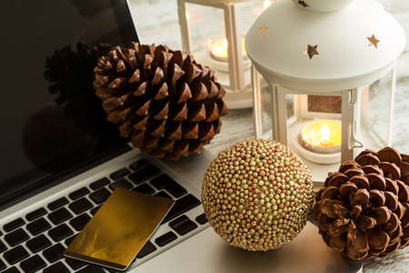 Buying Christmas presents on line with the credit card.の写真素材