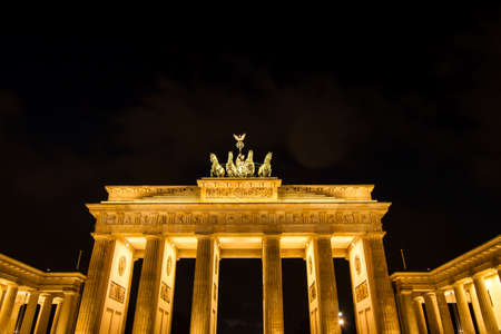 The Brandenburg Gate at night, in Berlin, Germanyの写真素材