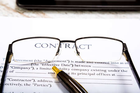 Reading a Contract before signingの写真素材