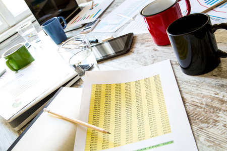 Business meeting, analyzing graphs, statistics and Business Planの写真素材