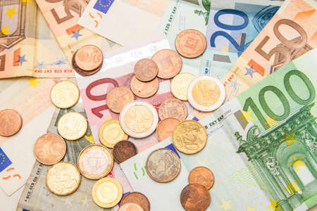Euros banknotes and coinsの写真素材