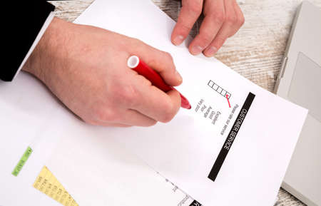 Customer service, a businessman rate the serviceの写真素材