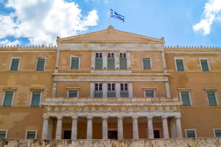 Greek flag waving in the top of Greek Parliamentのeditorial素材