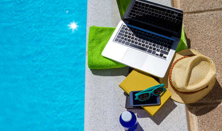 Using the computer meanwhile having a sunbath