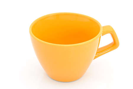 A yellow cup on the white background