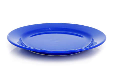 A blue plate on the white backgroundの写真素材