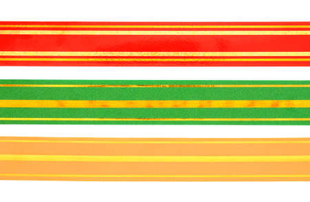 Color ribbon for decorating gifts on the white backgroundの写真素材