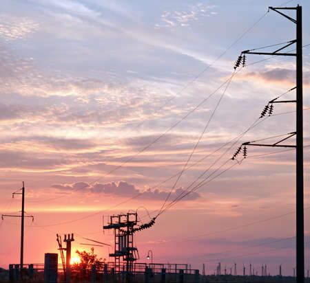 Electric main against the evening sky