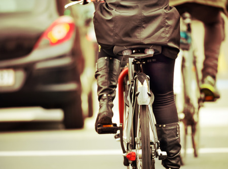 Bikes in the evening, in trafficの写真素材