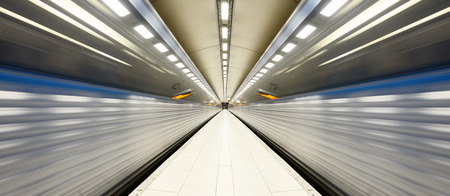 Train arriving to subway station platformの写真素材
