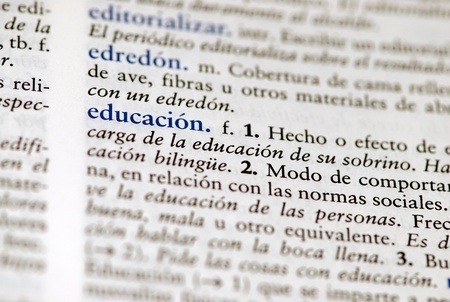 Spanish dictionary definition of the word education with focus on education and a hallow field depth のeditorial素材