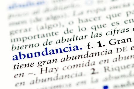Closeup of the Spanish dictionsary word for abundanceの写真素材