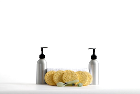 Various professional spa products arranged on a white backgroundの写真素材